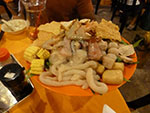 We begin with a tray of different types of seafood